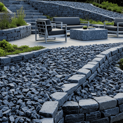 Roche gris aux reflets bleutés pour une rocaille de jardin