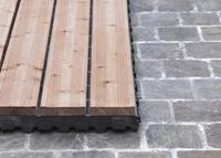 Pose de dalle clipsable sur pavés